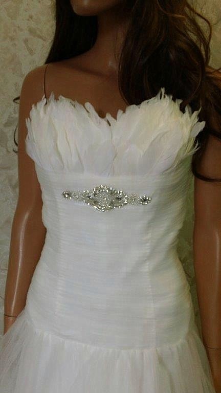 Wedding dress with 2024 feathers on bust